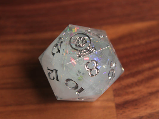Large icy blue d20 with silver paint.